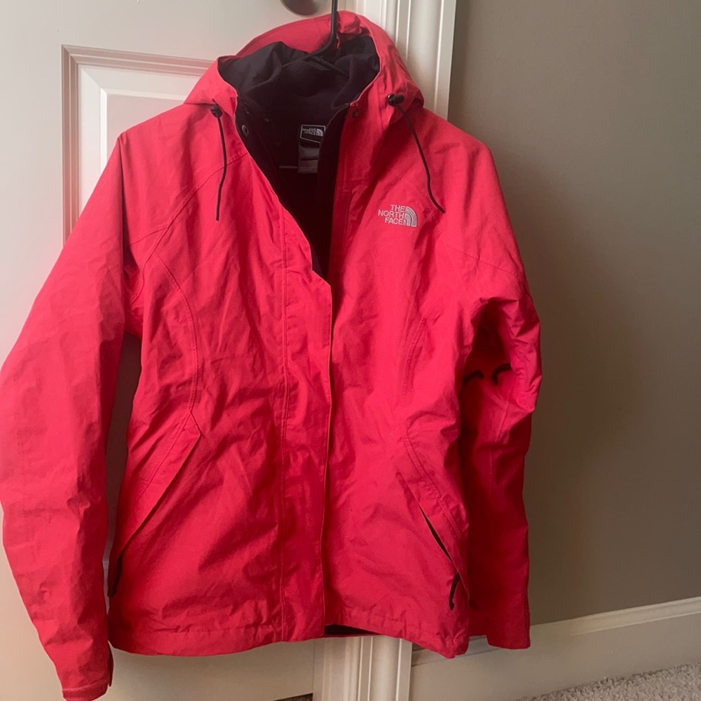 Pink women’s north face jacket.